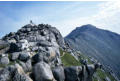 Rocky tors on the summit ridge, Goat Fell in the distance