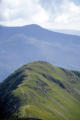 The path to Buttermere leads over Whiteless Pike; beyond lies Red Pike