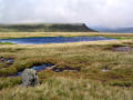 Tarn near Swarth Fell, looking back to Wild Boar Fell