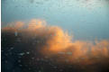 Clouds at sunset - reflection in the river
