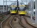 Passing trams near Deansgate