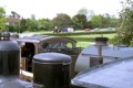 Loco view - a traction engine trundles down towards the level crossing