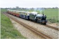 &quot;Southern Maid&quot; hurries along the main line near New Romney