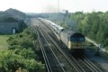 47 314 pulls away from Ashford with tunnel-bound car train