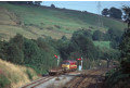 56 071 joins the main line at New Mills