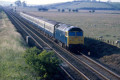 Class 47 heads a southbound passenger, Lucker, 10 July 1978