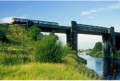 DMU crosses Irlam viaduct