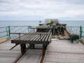 Luggage wagon; pier restoration work proceeds