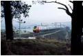 A southbound &quot;Voyager&quot; skims down the bank, Shap