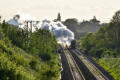 7029 "Clun Castle" steams out of the sun near Preston Boats