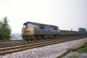 D1058 "Western Reliance" on westbound stone empties