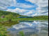 2= C HUGHES Arriva reflections at Stokesay Pool 